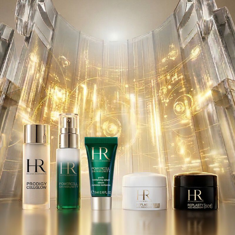 Helena Rubinstein set en wit tasje onder blauweregen.​