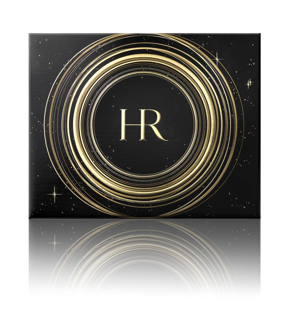 Geopende zwarte en gouden geschenkdoos, met vier gelabelde Helena Rubinstein "Re-Plasty" producten (serum, nachtcreme, dagcreme) en het "HR" logo, op een witte achtergrond.